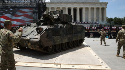 Members of the U.S. Army park an M1 Abrams tank in front of the Lincoln Memorial ahead of the Fourth of July 