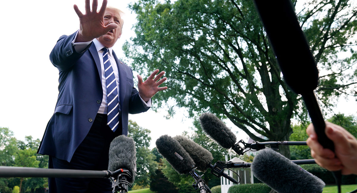 U.S. President Donald Trump talks with reporters as he departs the White House July 19, 2019 in Washington, DC. Trump is traveling to New Jersey to host a fundraising dinner and spend the weekend at his Trump National Golf Club in Bedminster.