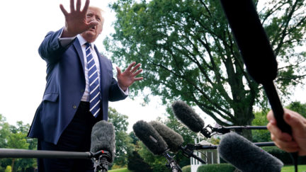 U.S. President Donald Trump talks with reporters as he departs the White House July 19, 2019 in Washington, DC. Trump is traveling to New Jersey to host a fundraising dinner and spend the weekend at his Trump National Golf Club in Bedminster.