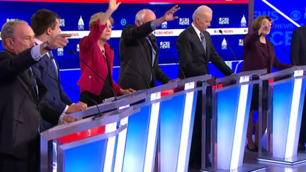Democrats raise their hands attempting to speak in chaotic Democratic Debate (via screenshot)