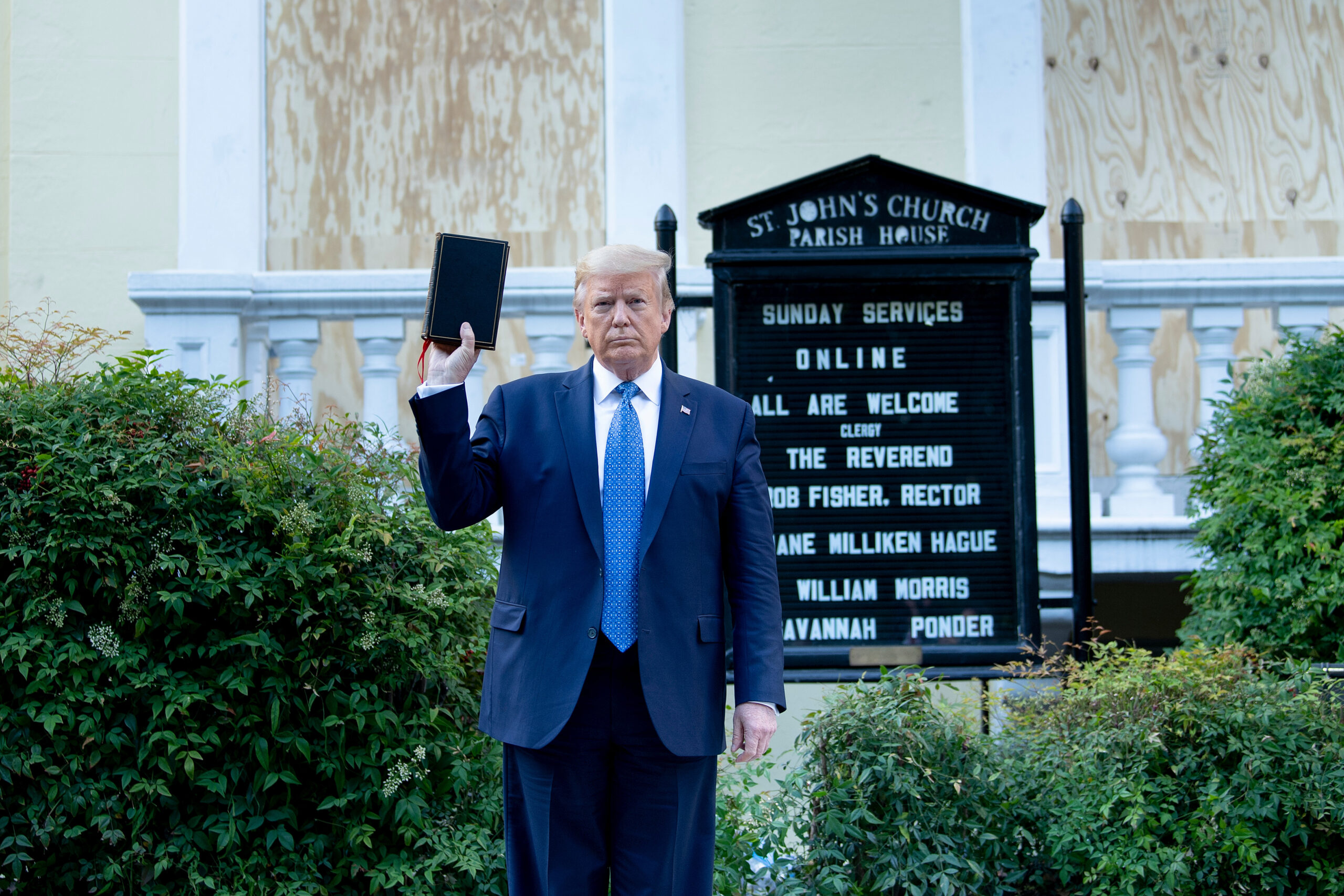 President Donald Trump holds a Bible while visiting St. John's Church across from the White House
