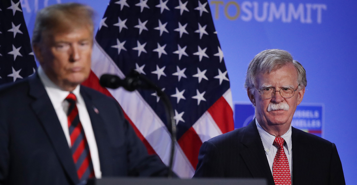 U.S. President Trump with National Security Advisor John Bolton on July 12, 2018 in Belgium