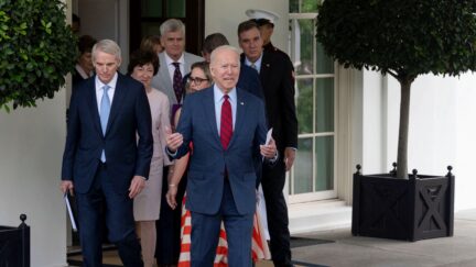 US President Joe Biden walks out of the White House with a group of US Senators after a meeting on infrastructure negotiations on June 24, 2021 in Washington, DC. - Biden announced he has reached a deal with the bipartisan group of senators on a landmark infrastructure package, likely the most funding for roads, bridges and ports in decades. (Photo by Jim WATSON / AFP) (Photo by JIM WATSON/AFP via Getty Images)