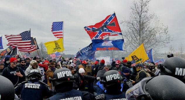 Trump supporters clash with police and security forces as they storm the US Capitol in Washington D.C on January 6, 2021. - Demonstrators breeched security and entered the Capitol as Congress debated the a 2020 presidential election Electoral Vote Certification. (Photo by Joseph Prezioso / AFP) (Photo by JOSEPH PREZIOSO/AFP via Getty Images)