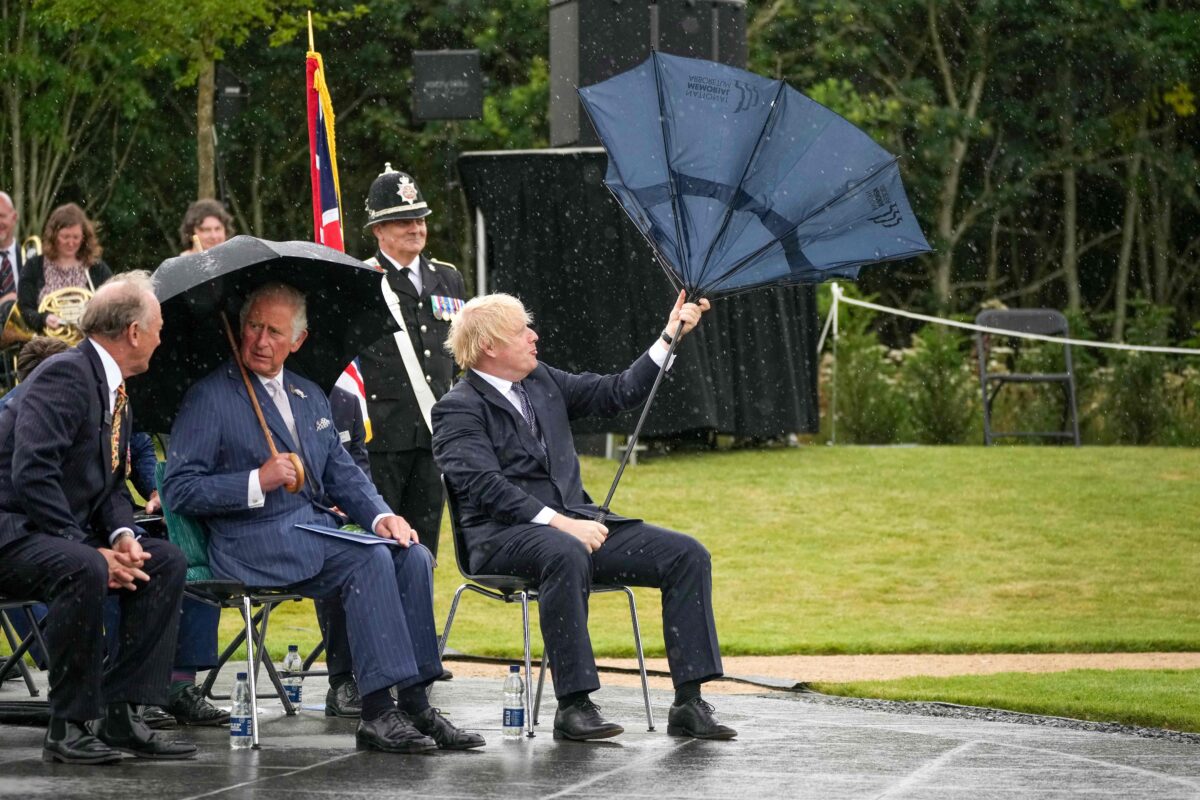Boris Johnson with an inverted umbrella