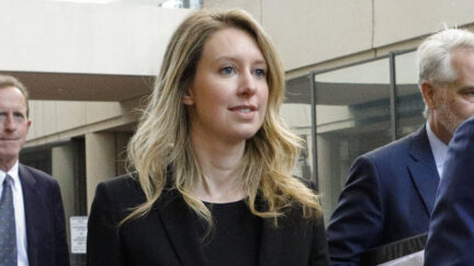 SAN JOSE, CA - JULY 17: Former Theranos CEO Elizabeth Holmes (C) leaves federal court with her legal team after a status hearing on July 17, 2019 in San Jose, California. Holmes is facing charges of conspiracy and wire fraud for allegedly engaging in a multimillion-dollar scheme to defraud investors with the Theranos blood testing lab services. (Photo by Kimberly White/Getty Images)