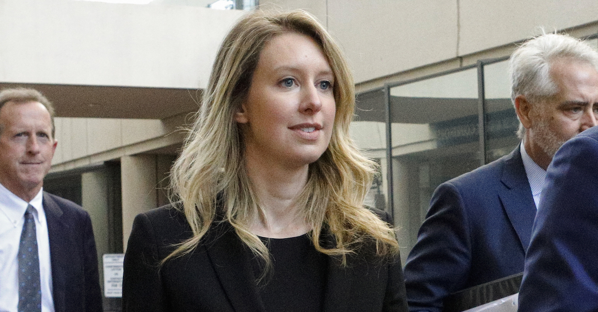 SAN JOSE, CA - JULY 17: Former Theranos CEO Elizabeth Holmes (C) leaves federal court with her legal team after a status hearing on July 17, 2019 in San Jose, California. Holmes is facing charges of conspiracy and wire fraud for allegedly engaging in a multimillion-dollar scheme to defraud investors with the Theranos blood testing lab services. (Photo by Kimberly White/Getty Images)