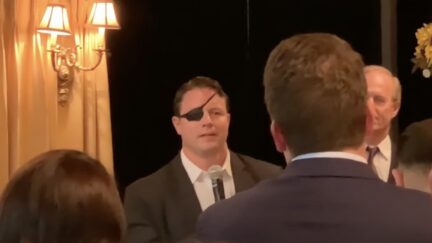 Dan Crenshaw and Heckler
