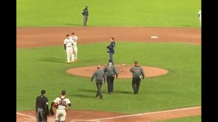 Fan on the field at Oracle Park