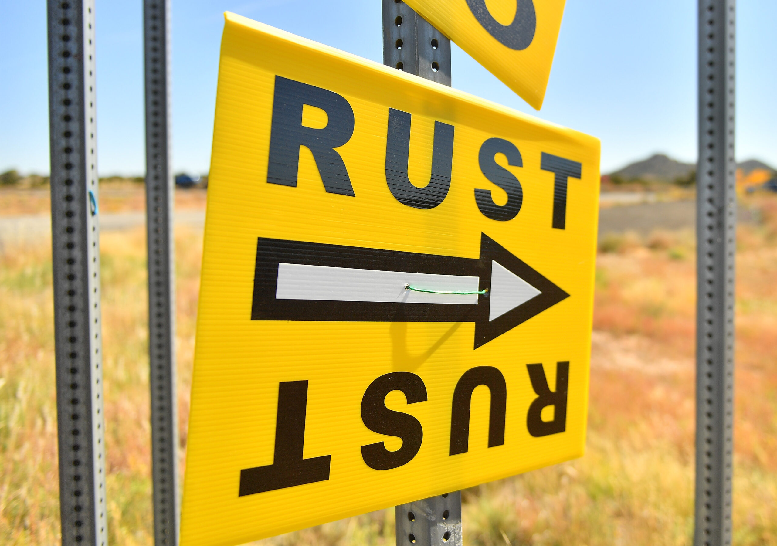 Sign directing to Rust set in New Mexico