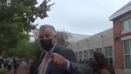 Terry McAuliffe Ridicules Mask-Less Activist Outside Offices
