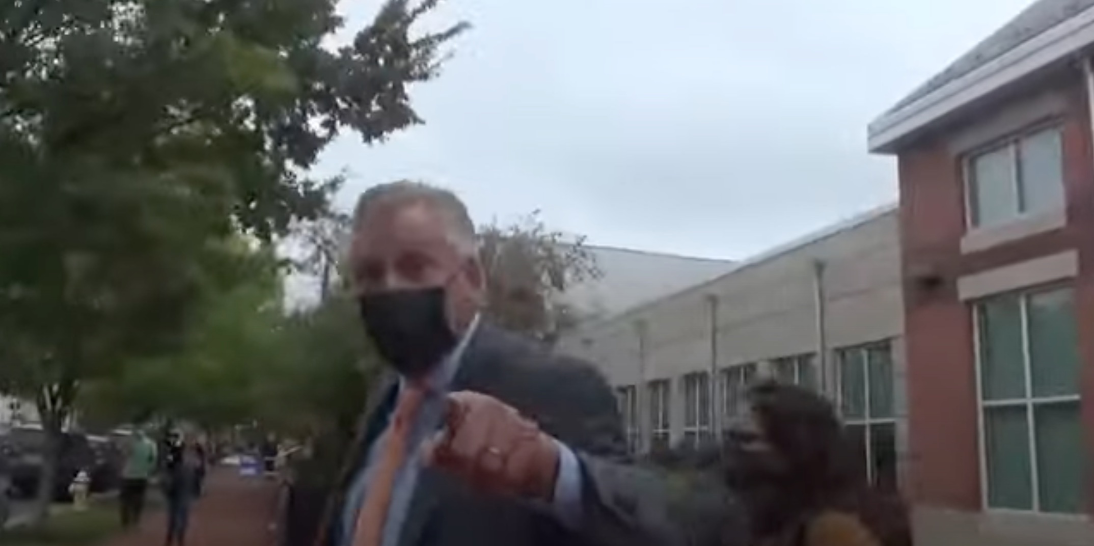 Terry McAuliffe Ridicules Mask-Less Activist Outside Offices