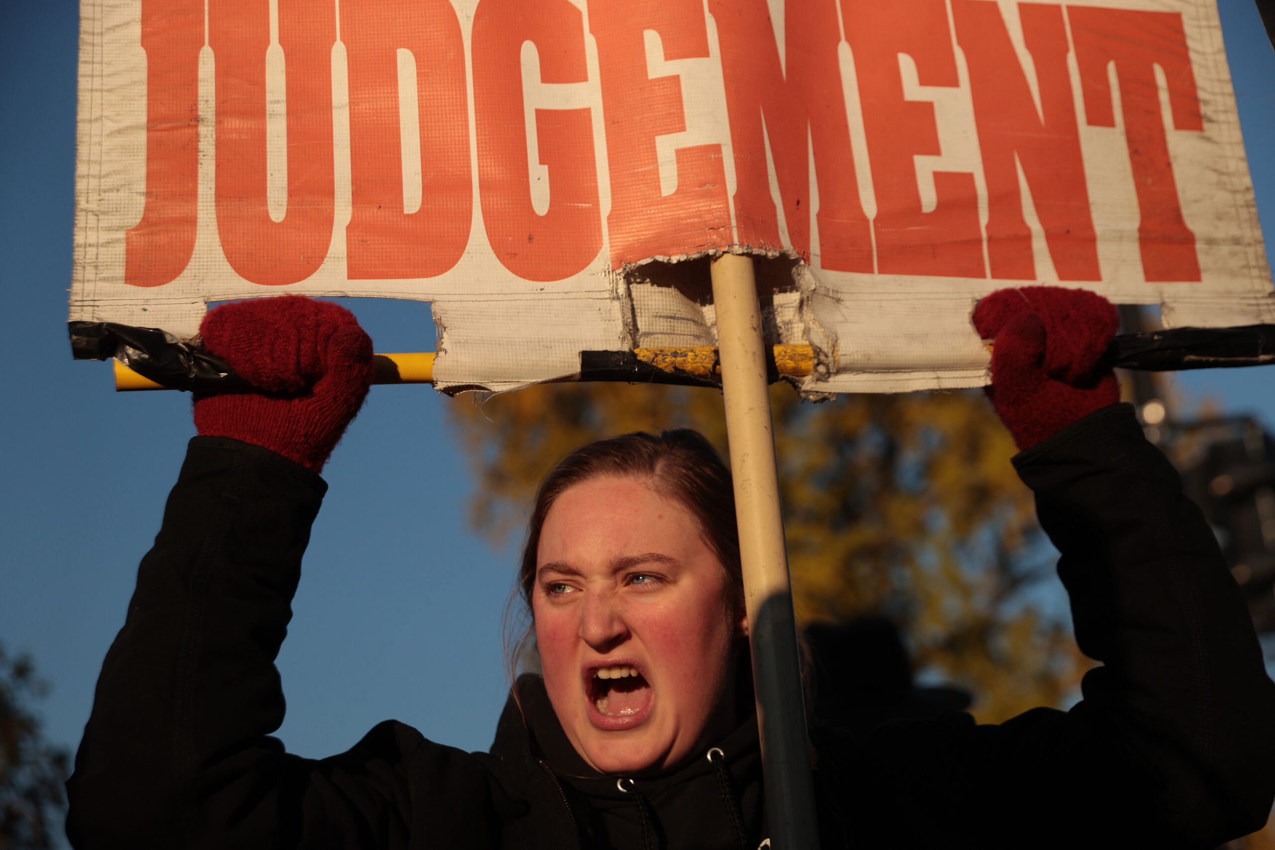 WASHINGTON, DC - DECEMBER 01: An anti-abortion demonstrator hurls insults at pro-choice activists in front of the U.S. Supreme Court as the justices hear hear arguments in Dobbs v. Jackson Women's Health, a case about a Mississippi law that bans most abortions after 15 weeks, on December 01, 2021 in Washington, DC. With the addition of conservative justices to the court by former President Donald Trump, experts believe this could be the most important abortion case in decades and could undermine or overturn Roe v. Wade. (Photo by Chip Somodevilla/Getty Images)