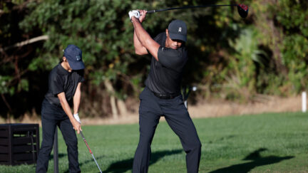 Tiger Woods tees off for first time since car crash
