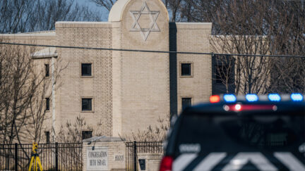 A law enforcement vehicle sits in front of the Congregation Beth Israel synagogue on January 16, 2022 in Colleyville, Texas.