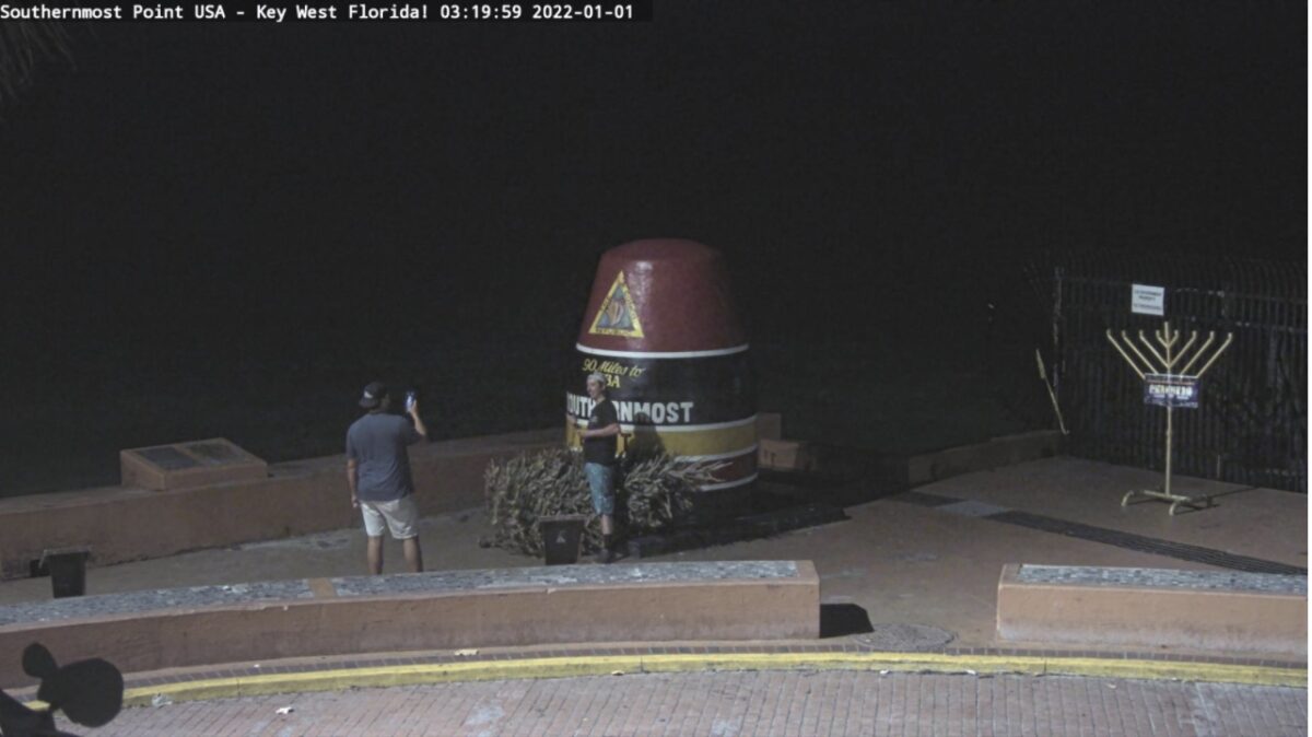 Southernmost Webcam Captures Arsonists Taking Selfies Before Burning Christmas Tree at Key West Buoy