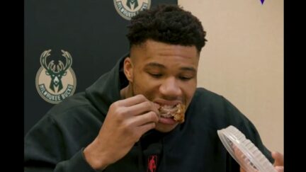 Giannis Antetokounmpo devours chicken wings during postgame presser