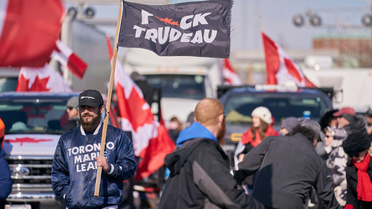 Protestors who are in support of the Truckers Freedom Convoy block the roadway at the Ambassador Bridge border crossing, in Windsor, Ontario on February 9