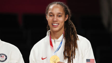 Brittney Griner #15 of Team United States poses for photographs with her gold medal during the Women's Basketball medal ceremony on day sixteen of the 2020 Tokyo Olympic games