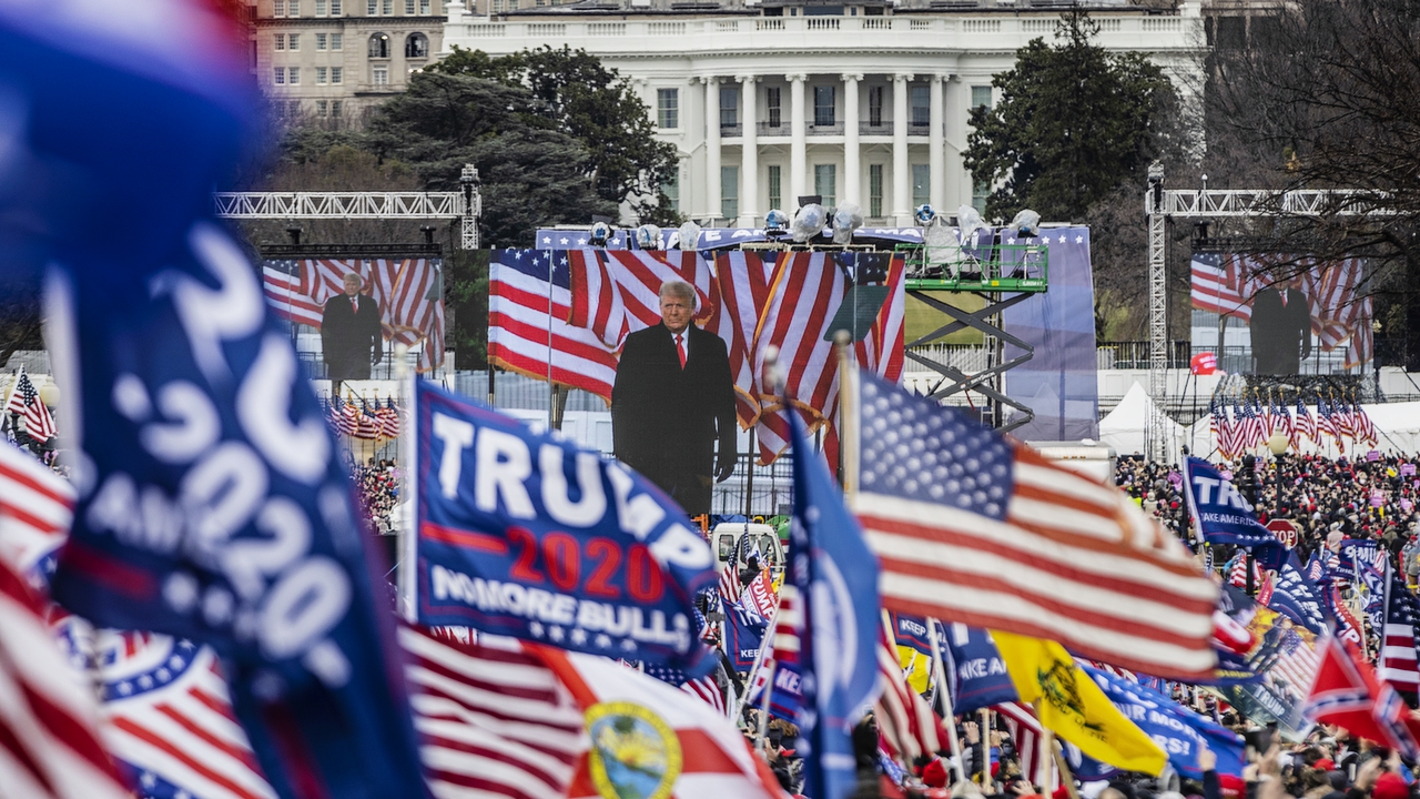 WASHINGTON, DC - JANUARY 06: U.S. President Donald Trump is seen on a screen as his supporters cheer during a rally on the National Mall on January 6, 2021 in Washington, DC. Trump supporters gathered in the nation's capital today to protest the ratification of President-elect Joe Biden's Electoral College victory over President Trump in the 2020 election