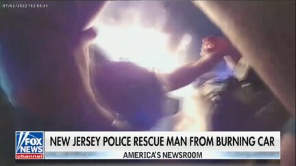 New Jersey police rescue man from burning car