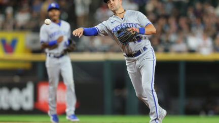 Whit Merrifield making a throw