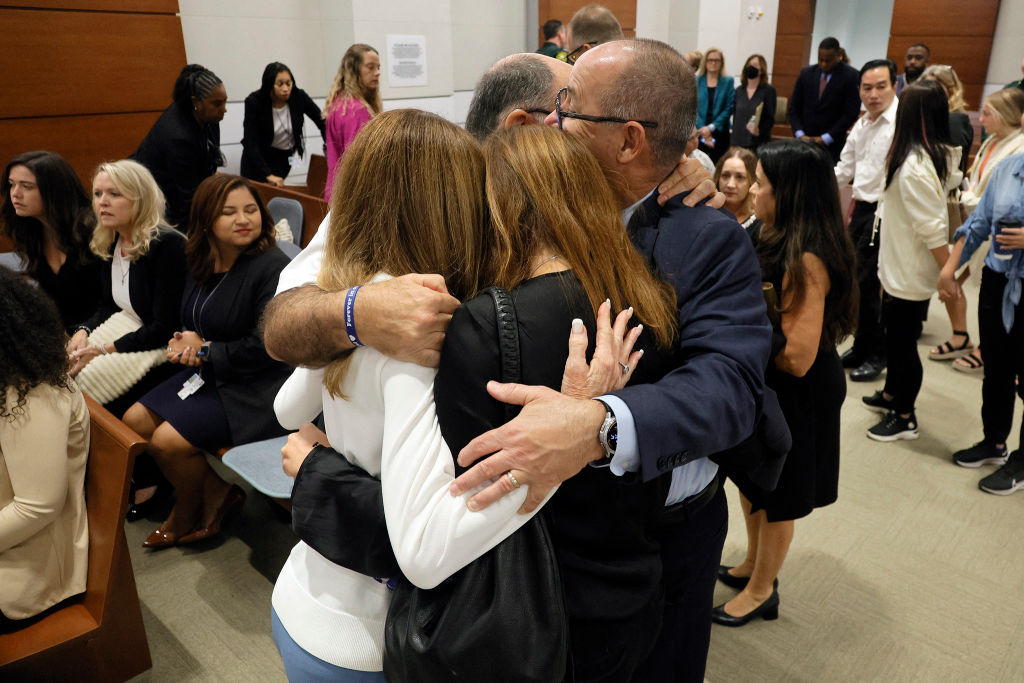 Parkland families hug while awaiting verdict