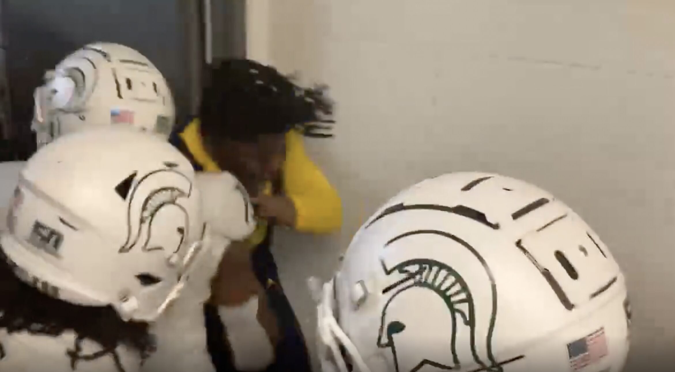 Disturbing Video Shows Group of Michigan State Players Beating Up on a Michigan Player in Tunnel After the Game