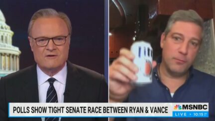 Tim Ryan holds up Miller Lite
