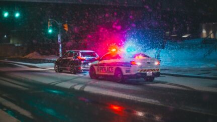 Police pull over car