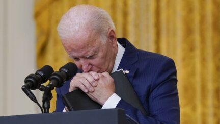 FILE - President Joe Biden pauses as he listens to a question about the bombings at the Kabul airport that killed at least 12 U.S. service members, from the East Room of the White House, Aug. 26, 2021, in Washington.