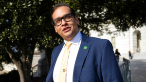 George Santos in a blue suit and yellow tie