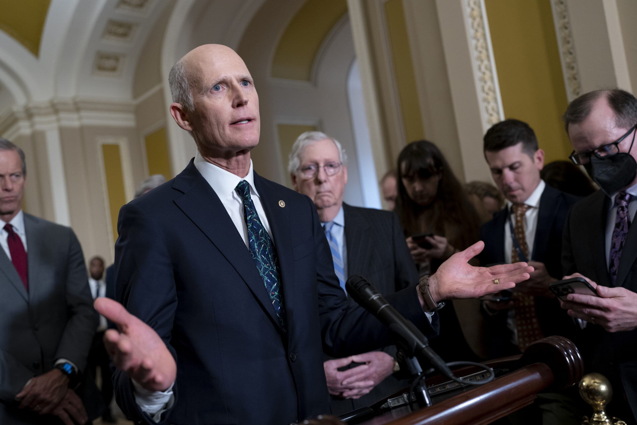 Rick Scott and Mitch McConnell