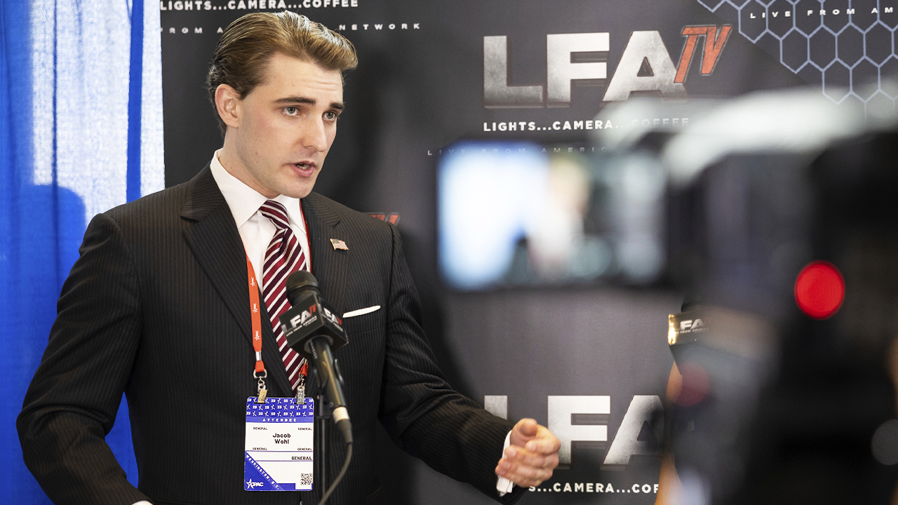 Jacob Wohl gives interview March 2 at CPAC 2023 in National Harbor, Maryland