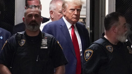 Trump walking to be arraigned