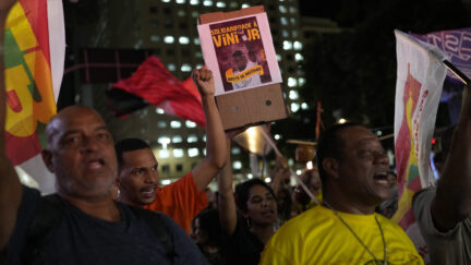 Brazilian soccer fans attend a protest against the racist abuse of soccer star Vini Jr.