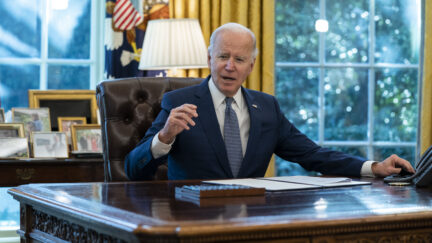 Joe Biden at desk in Oval Office