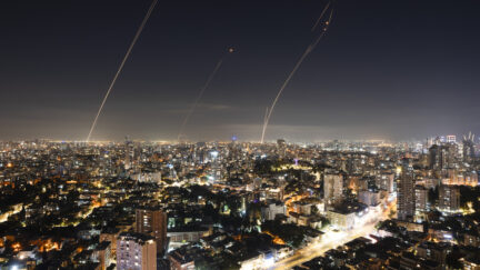 Israeli Iron Dome air defense system fires to intercept a rocket fired from the Gaza Strip, in central Israel, Sunday, Nov. 5, 2023.
