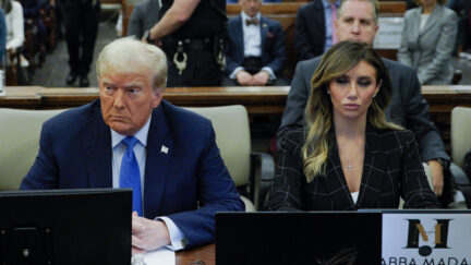 Donald Trump sitting next to attorney Alina Habba in courtroom
