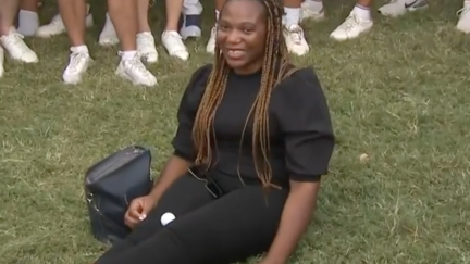 Golf ball lands on woman's lap