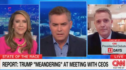 Jim Acosta and Scott Jennings