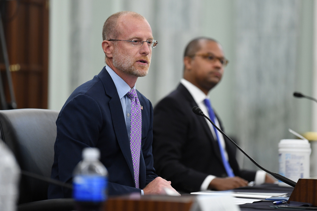 FILE - Brendan Carr answers questions during a Senate Commerce, Science, and Transportation committee hearing to examine the Federal Communications Commission on Capitol Hill in Washington, June 24, 2020. 