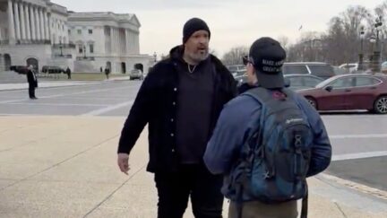 Former Capitol Police officer Harry Dunn confronts Capitol rioter