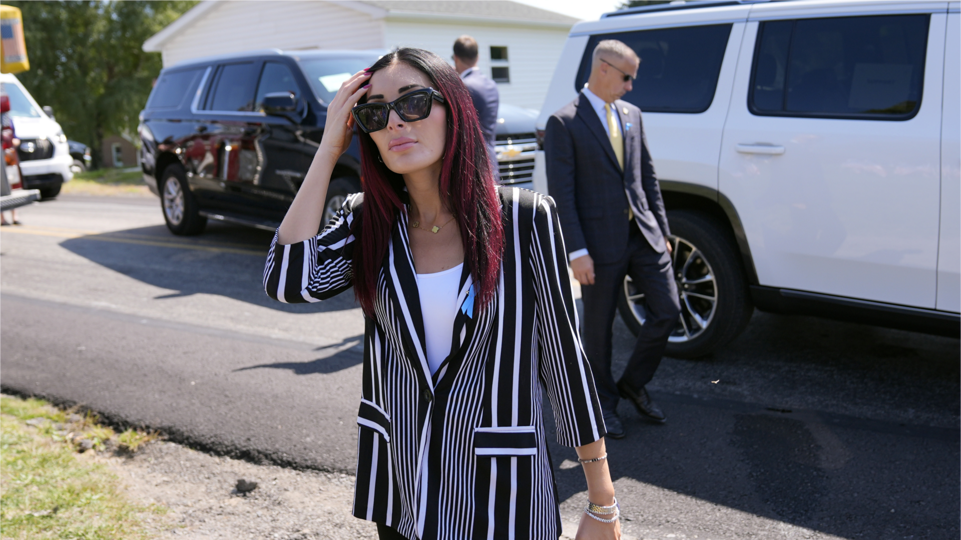 Laura Loomer arrives with Republican presidential nominee former President Donald Trump for a visit to the Shanksville Volunteer Fire Company in Shanksville, Pa., Wednesday, Sept. 11, 2024.