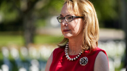 Former congresswoman and gun violence survivor Gabby Giffords, D-Ariz. attends a Gun Violence Memorial installation at Bayfront Park, Monday, Dec. 13, 2021, in Miami. The memorial is meant to bring awareness to the thousands of lives lost to gun violence every year. (AP Photo/Lynne Sladky)