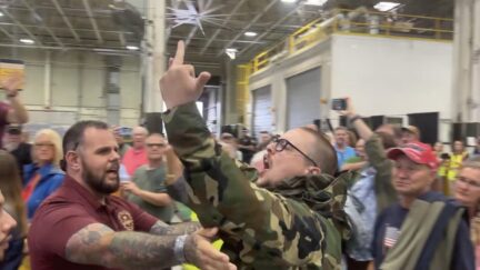 protester at Trump speech