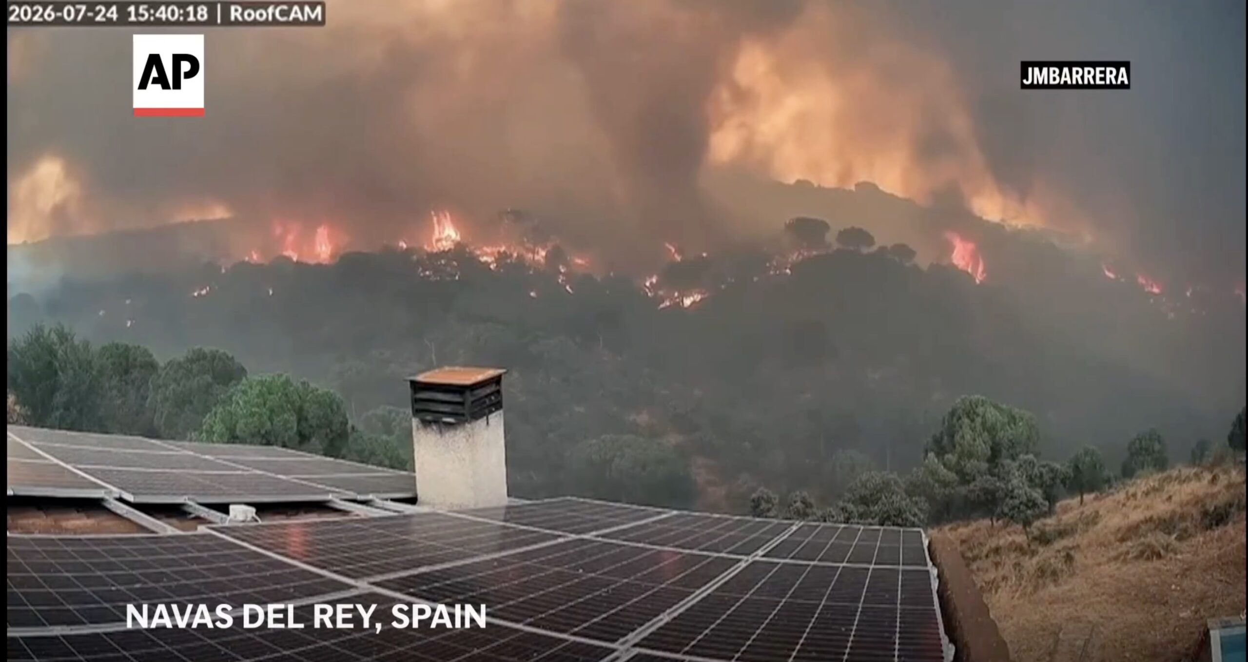Rooftop camera in spain captures advance of wildfires