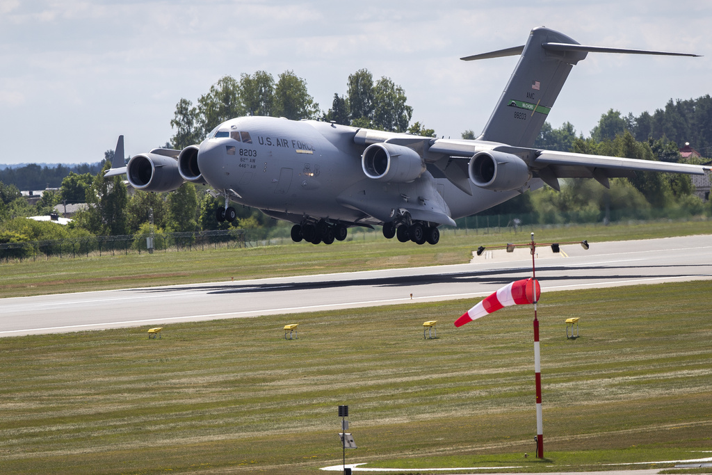 U.S. Air Force plane Boeing C-17A Globemaster III lands at Vilnius airport in Lithuania, Saturday, July 8, 2023. The Vilnius NATO summit will take place on 11-12 July. (AP Photo/Mindaugas Kulbis)