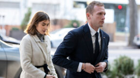 emily moreno follows behind max miller in a 2022 file photo