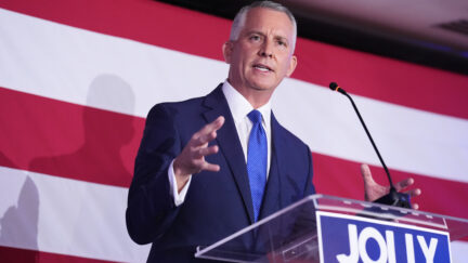 David Jolly in front of American flag